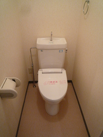 Toilet. A heated toilet seat