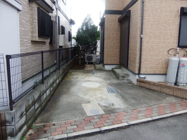 Parking lot. There is parking space for one car