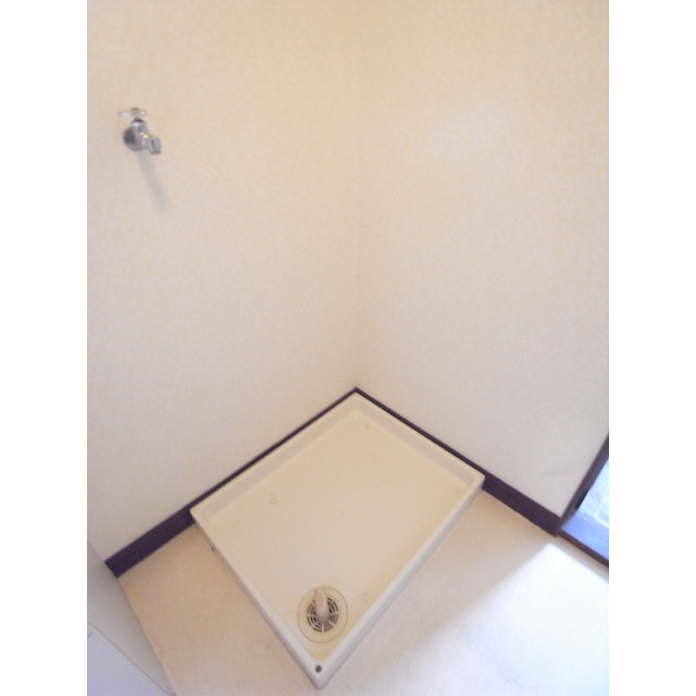 Other Equipment. Washing machine in the room