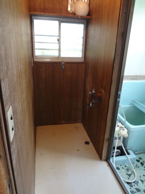 Other room space. Washing machine in the room