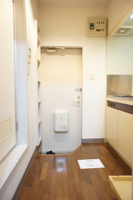 Living and room. Wide is around the kitchen