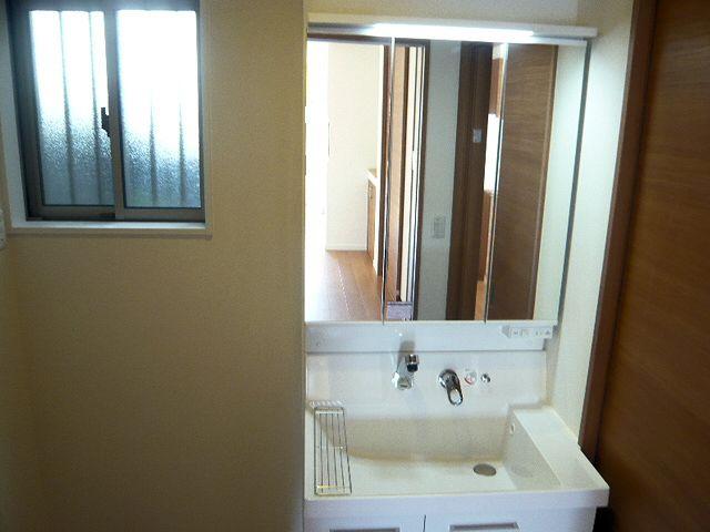 Wash basin, toilet. Vanity unit