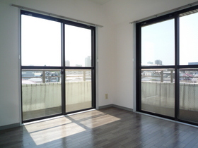 Living and room. It is a bright room with two-sided balcony.
