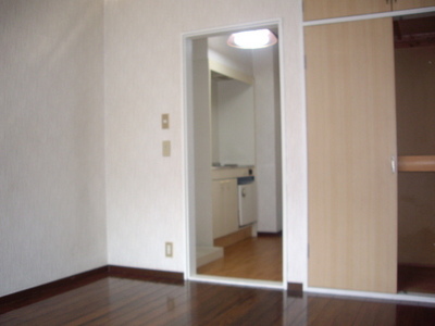 Living and room. Upper closet with spacious storage!