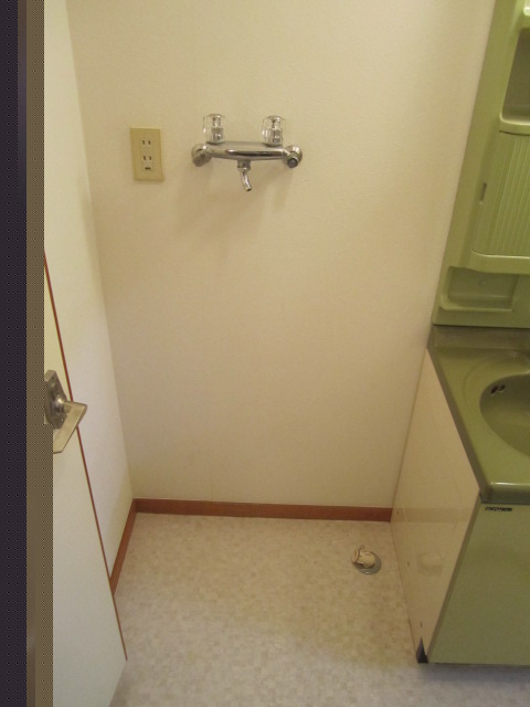 Other Equipment. Washing machine in the room