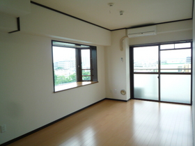 Living and room. Because the corner room, There is a bay window in the living room.