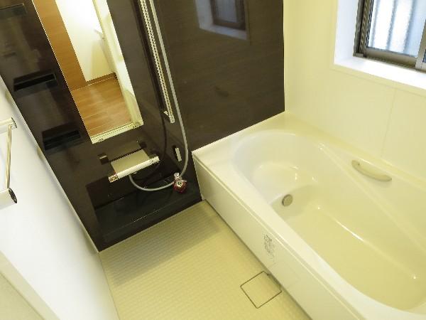 Bathroom. Spacious taking a tired bathroom refresh! 