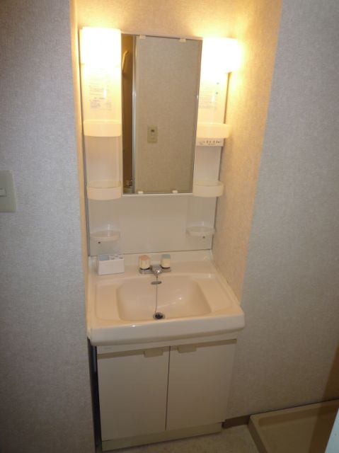 Washroom. Ease morning of preparation with independent wash basin