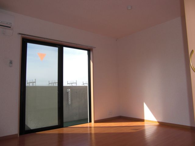 Living and room. View is also excellent in the top floor corner room. 