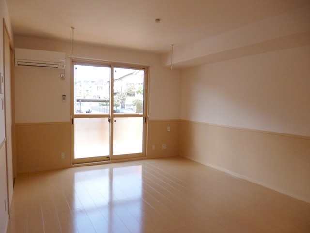 Living and room. Also impetus conversation with spacious living room there is a wood deck