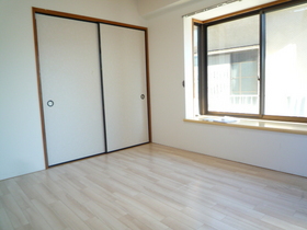 Living and room. With between 1 closet.