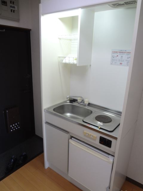 Kitchen. Mini fridge with a kitchen.