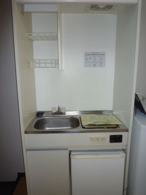 Kitchen. Mini fridge also lucky Kitchen