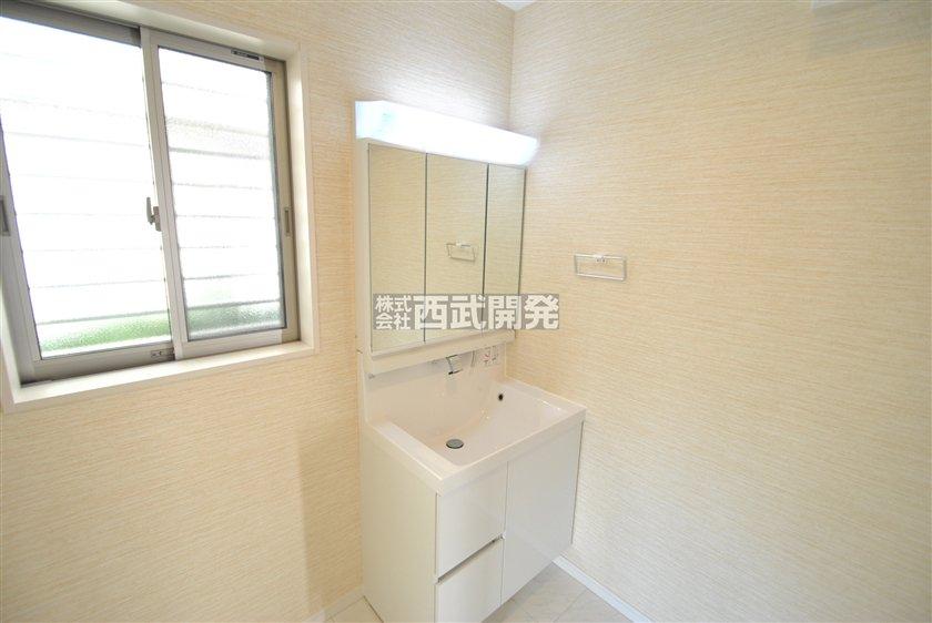 Wash basin, toilet. A Building