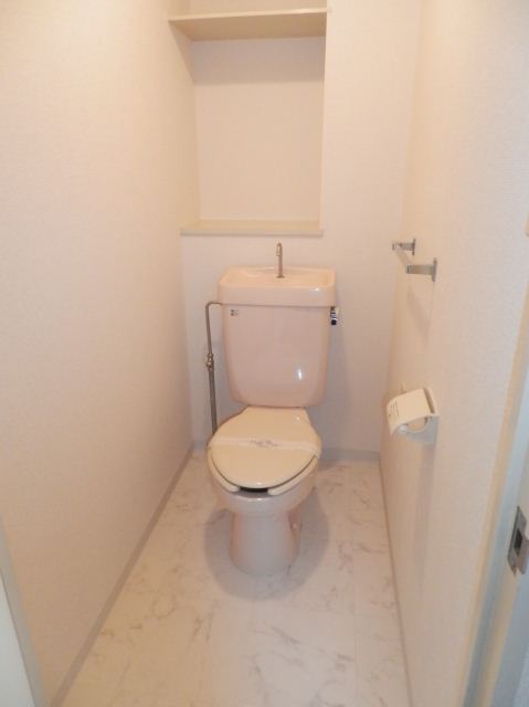 Toilet. Photo 205, Room reference.