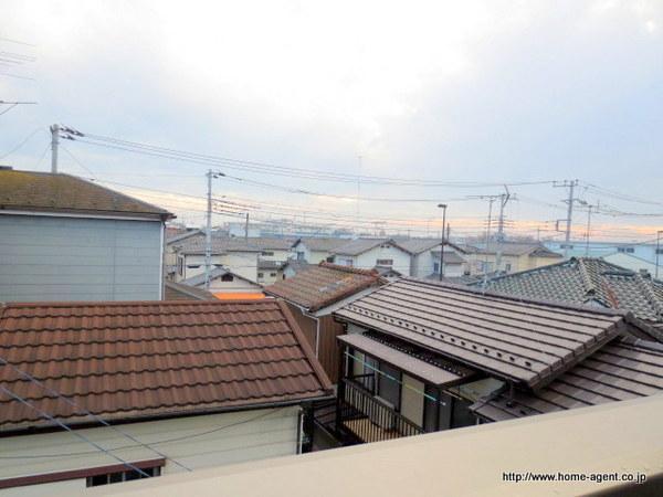 View photos from the dwelling unit. High building is less