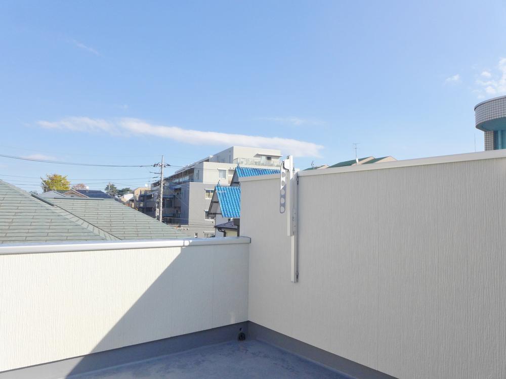 Balcony. Azure sky from the roof balcony.