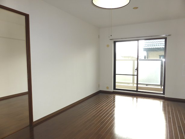 Living and room. Bright and airy living room facing the balcony