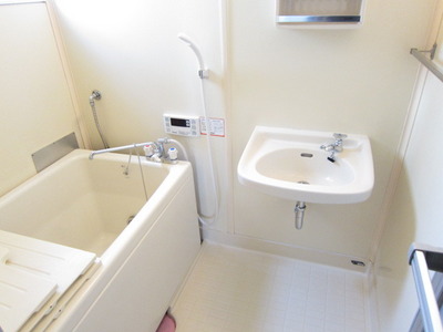 Bath. There is also a wash basin ~ !