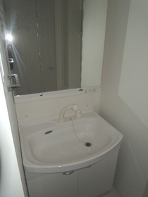 Washroom. Three-sided mirror Vanity of