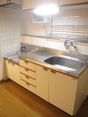 Kitchen. In housed plenty with hanging shelf