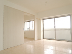 Living and room. It is living large windows.