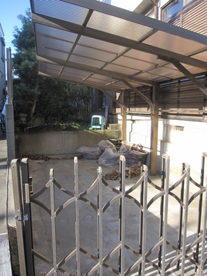 Parking lot. Parking is with a roof