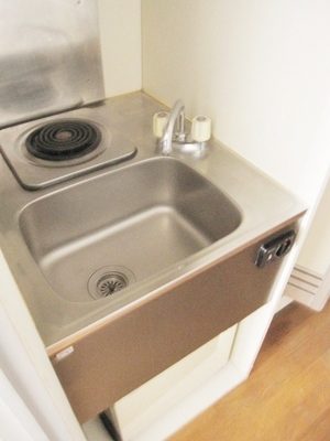 Kitchen. It is a mini kitchen with a refrigerator!