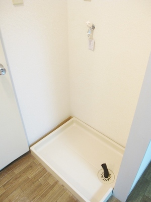 Other Equipment. Washing machine put in a room! 