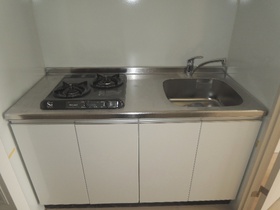 Kitchen. Two-burner gas stove is equipped kitchen.