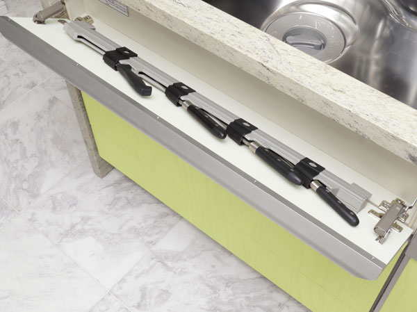 Kitchen.  [LIL pocket] Kitchen knife storage utilizing before sink.