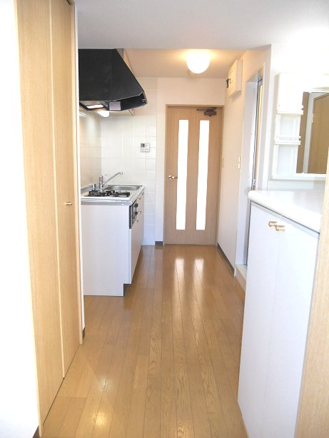 Entrance. Overlooking the kitchen from the front door