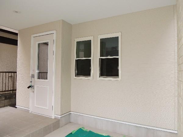 Local appearance photo. Stylish white entrance door