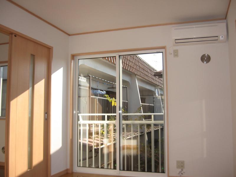 Other. The photograph is in a different Room No..