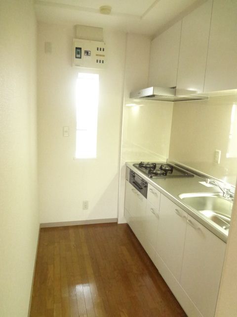 Kitchen. Photo is a thing of the same floor plan of the third floor