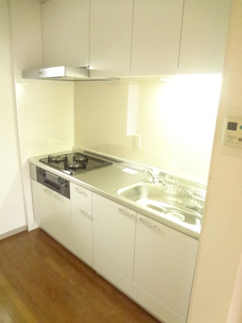 Kitchen. Photo is a thing of the same floor plan of the third floor