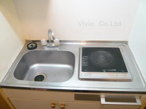 Kitchen. Kitchen is one-burner stove of IH.