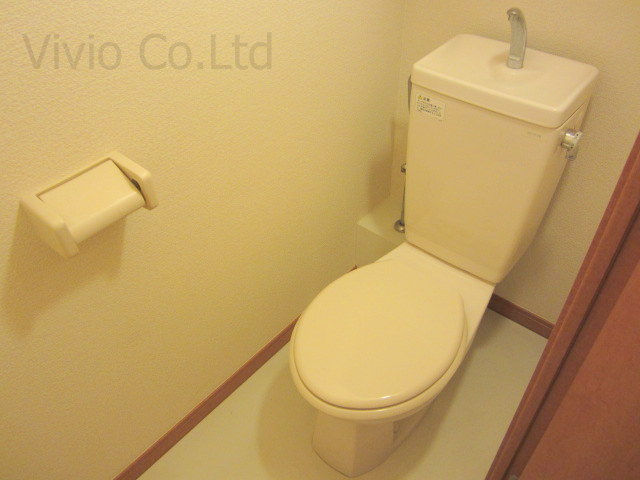 Toilet. I'm happy bus Restroom.