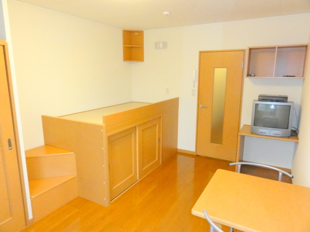 Living and room. Is a room of beautiful flooring. 