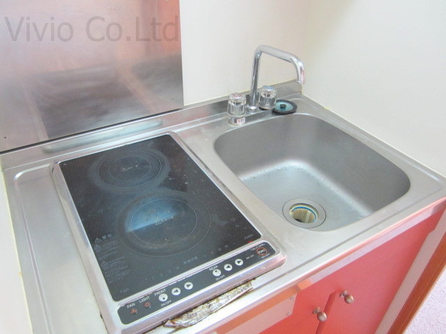 Kitchen. It is a simple electric stove Care