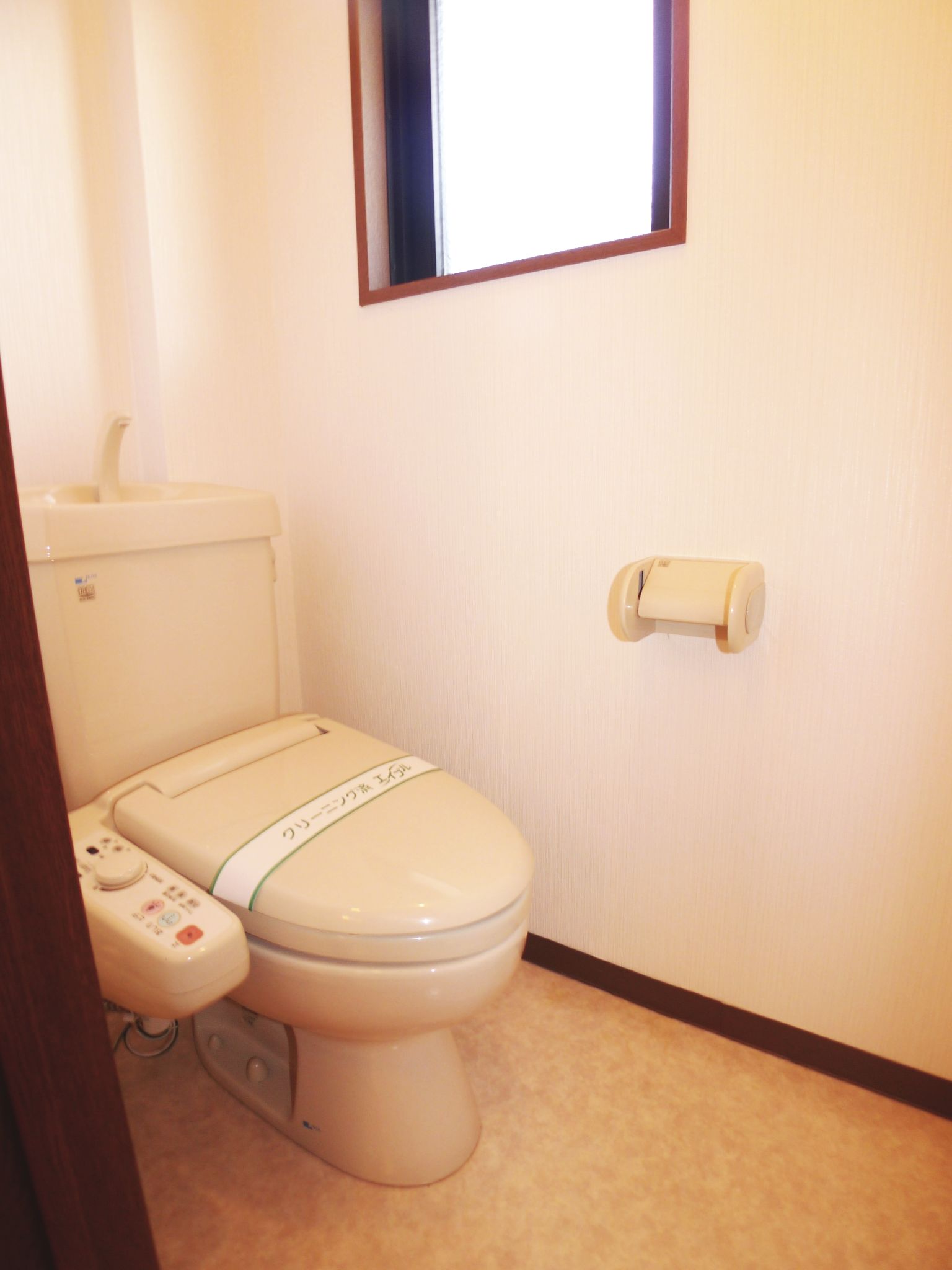 Toilet. We have with a window