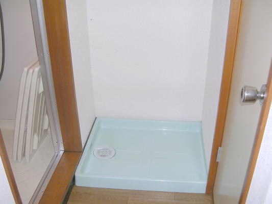 Other Equipment. Washing machine in the room