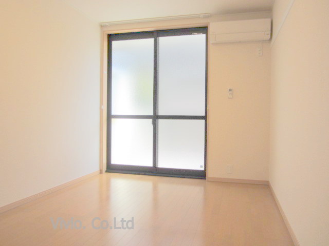 Living and room. The window is a bright big.