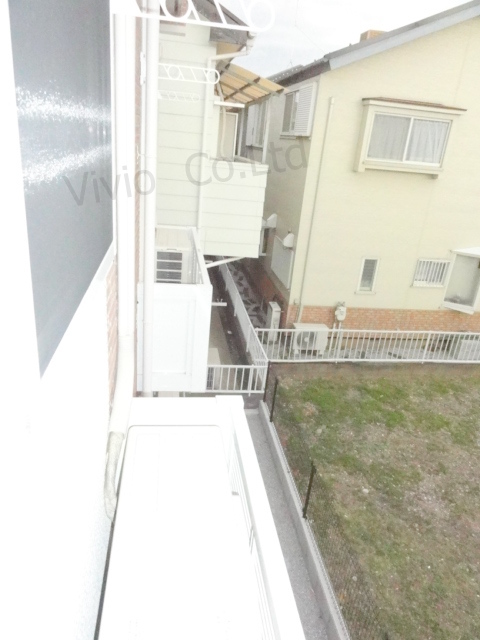 Balcony. Flower is a box.