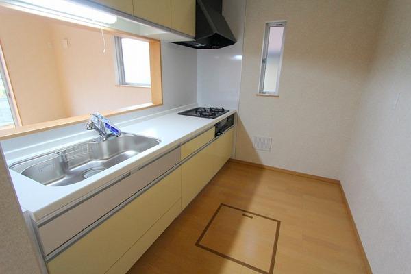 Kitchen. System kitchen Artificial marble top 3-burner stove There is under-floor storage Handy to store food. Single lever mixing faucet With water purifier of delicious water Convenient hand shower