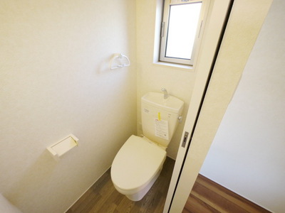 Toilet. There is a window in the toilet! 