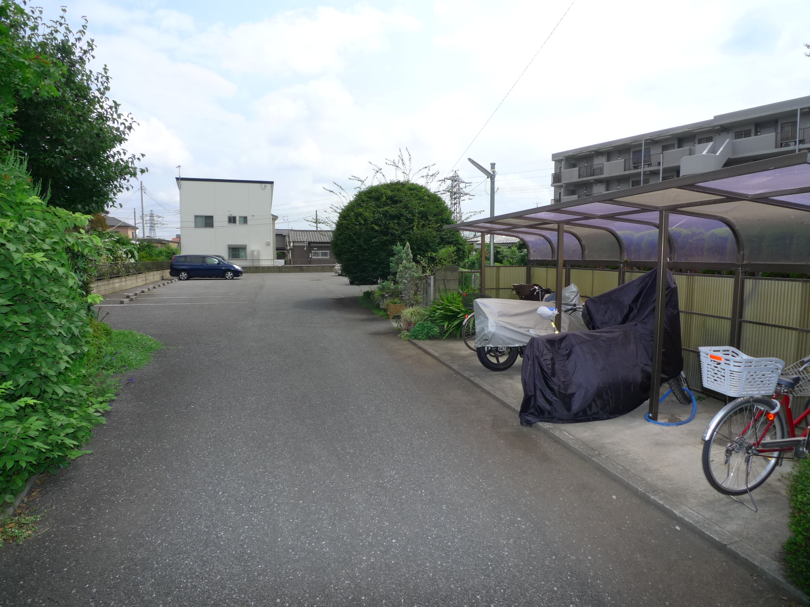 Parking lot. There is also a bicycle parking