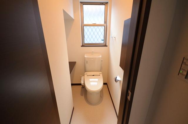 Toilet. First floor toilet with warm water washing toilet seat. 