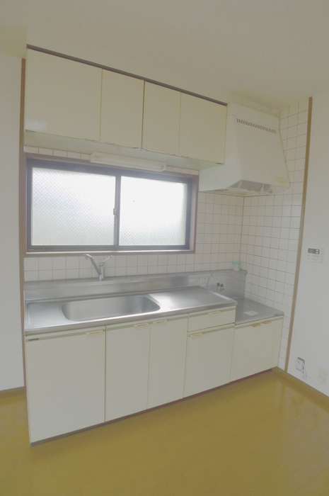 Kitchen. There is a window is bright