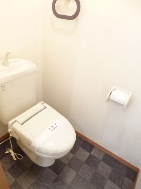 Toilet. A heated toilet seat